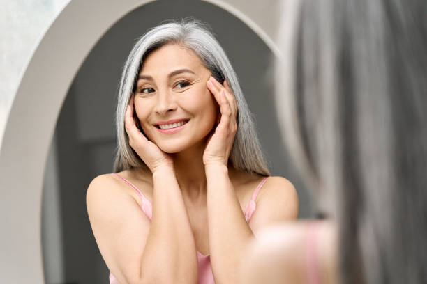 Senior woman promoting face-lifting products as a social media influencer